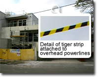 Photo of 'tiger strips' outside a commercial construction.