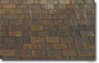 Photo of roof with slate roof tiles.